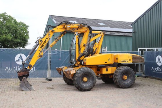 Wheel excavator Mecalac 12 MXT Diesel 68kW 1997 Mecalac 12 MXT 1997 2 Wheeled Excavators