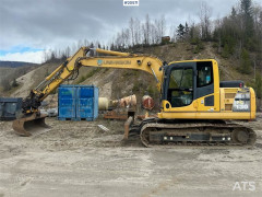 Komatsu PC130-8 crawler excavator w/ bucket and rototilt. 