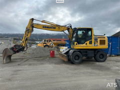 Komatsu PW160-10 wheeled excavator w/rototilt and 2 bucket