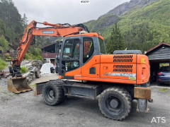 Doosan DX140W-3 Wheeled excavator w/ Oilquick, Rototilt a
