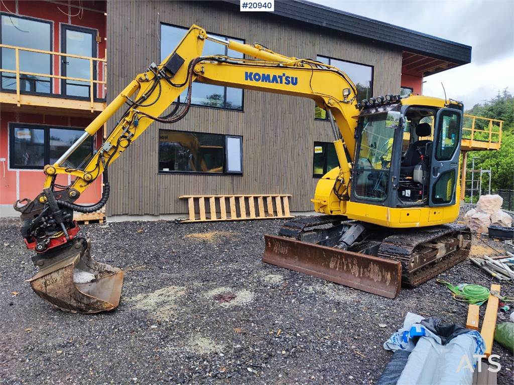 Komatsu PC78US-10 excavator with rototilt and 3 buckets. W image