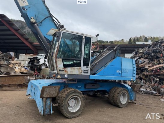 Fuchs MHL 350 wheeled excavator with elevating cab and g Fuchs MHL 350 wheeled excavator with elevating cab and g 2011 2 W...