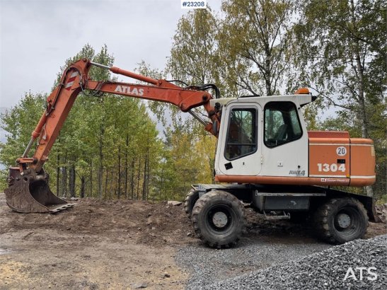 Atlas 1304 w/ 1 backhoe bucket Low Hours! 1304 w/ 1 backhoe bucket Low Hours! 2002 2 Wheeled Excavators