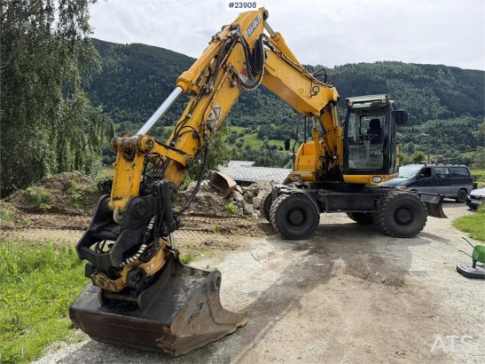 JCB JS145W wheeled machine with a cleaning bucket and JS145W wheeled machine with a cleaning bucket and 2008 2 Wheeled Exc...