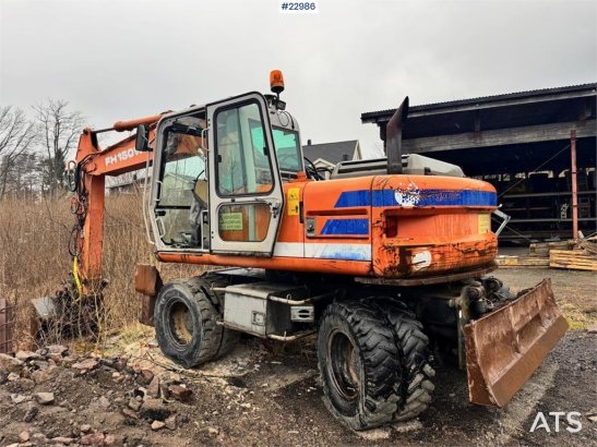 Fiat-Hitachi 150W.3 wheeled excavator with rototilt and grading Fiat-Hitachi 150W.3 wheeled excavator with rototilt and gr...