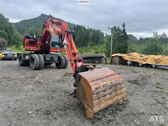 O&K MH4 Wheeled Excavator with Grading Bucket WATCH VI MH4 Wheeled Excavator with Grading Bucket WATCH VI 1998 2 Wheeled E...