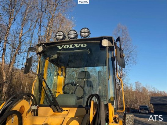 Volvo L50C wheel loader w/ 3 buckets, pallet forks, plow L50C wheel loader w/ 3 buckets, pallet forks, plow 1996 2 Wheel L...
