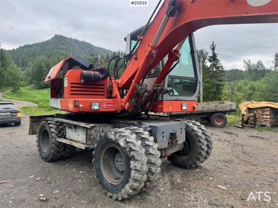 O&K MH4 Wheeled Excavator with Grading Bucket WATCH VI MH4 Wheeled Excavator with Grading Bucket WATCH VI 1998 2 Wheeled E...