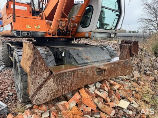 Fiat-Hitachi 150W.3 wheeled excavator with rototilt and grading Fiat-Hitachi 150W.3 wheeled excavator with rototilt and gr...