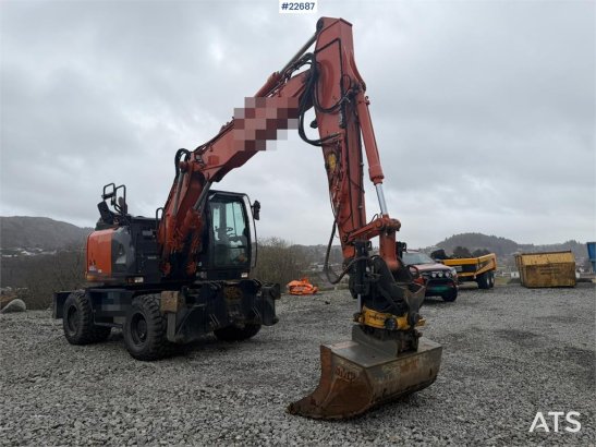 Hitachi zx145W wheeled machine w/ rototilt w/grab box, san zx145W wheeled machine w/ rototilt w/grab box, san 2020 2 Wheel...