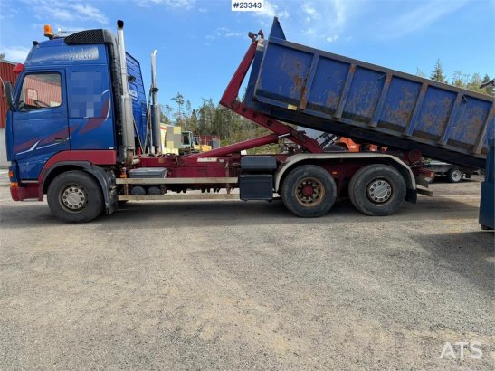 Volvo FH12 6x2 hook truck with a 20-ton hook and contain 590 2000 2 image 12