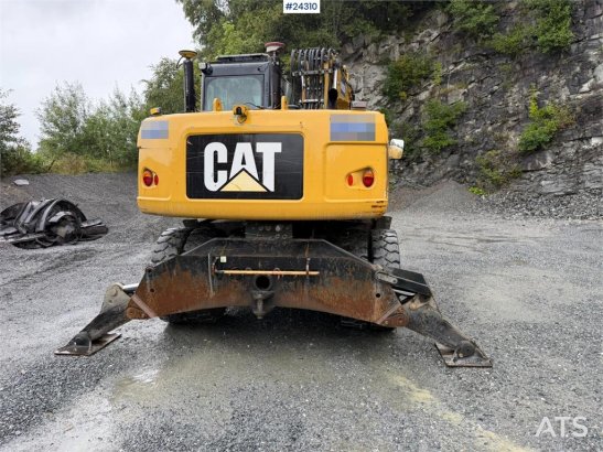 CAT M313 D wheeled excavator with Indexator tilt and S M313 D wheeled excavator with Indexator tilt and S 2013 2 Wheeled E...