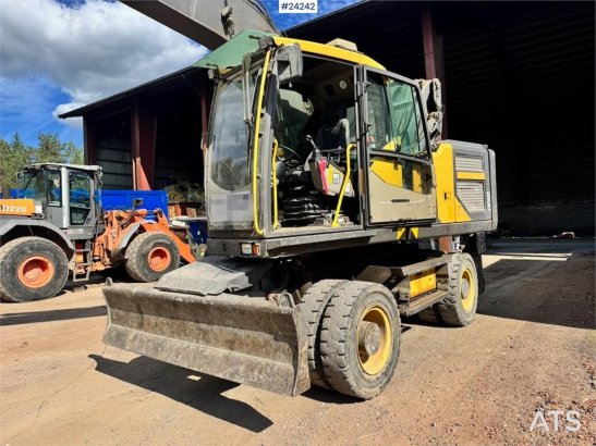 Volvo EW160E Wheeled Excavator w/ Elevating Cab and Grap EW160E Wheeled Excavator w/ Elevating Cab and Grap 2015 2 Wheeled...