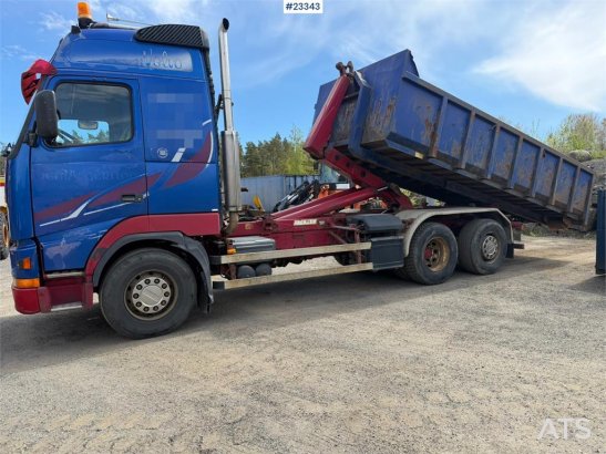 Volvo FH12 6x2 hook truck with a 20-ton hook and contain 590 2000 2 image 13
