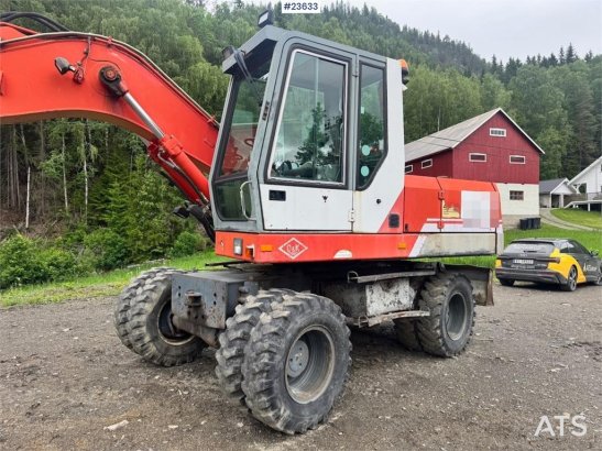 O&K MH4 Wheeled Excavator with Grading Bucket WATCH VI MH4 Wheeled Excavator with Grading Bucket WATCH VI 1998 2 Wheeled E...