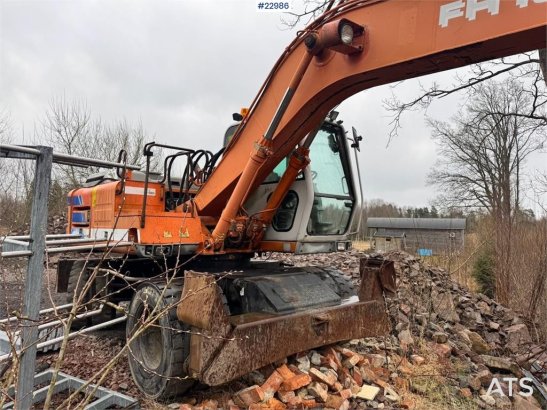 Fiat-Hitachi 150W.3 wheeled excavator with rototilt and grading Fiat-Hitachi 150W.3 wheeled excavator with rototilt and gr...