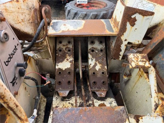 Bobcat 34.3 skid steer loader w/ extra tires and bucket. 34.3 skid steer loader w/ extra tires and bucket. 1986 2 image 13