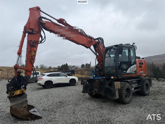 Hitachi zx145W wheeled machine w/ rototilt w/grab box, san zx145W wheeled machine w/ rototilt w/grab box, san 2020 2 Wheel...
