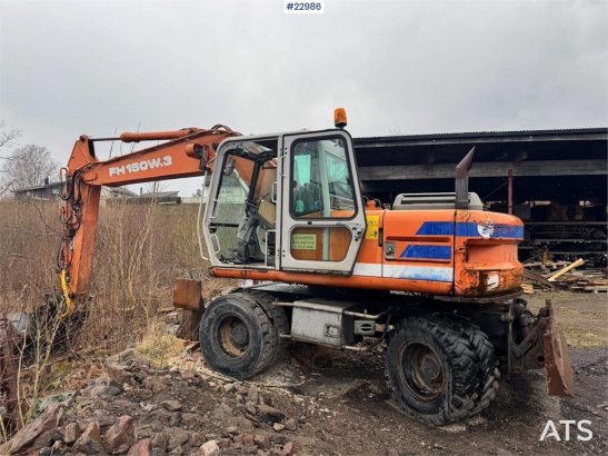 Fiat-Hitachi 150W.3 wheeled excavator with rototilt and grading Fiat-Hitachi 150W.3 wheeled excavator with rototilt and gr...
