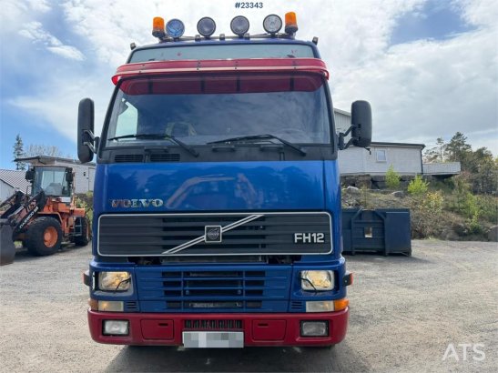 Volvo FH12 6x2 hook truck with a 20-ton hook and contain 590 2000 2 image 3
