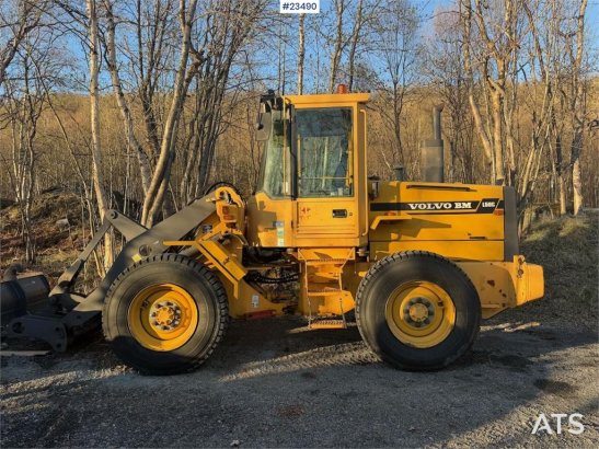 Volvo L50C wheel loader w/ 3 buckets, pallet forks, plow L50C wheel loader w/ 3 buckets, pallet forks, plow 1996 2 Wheel L...