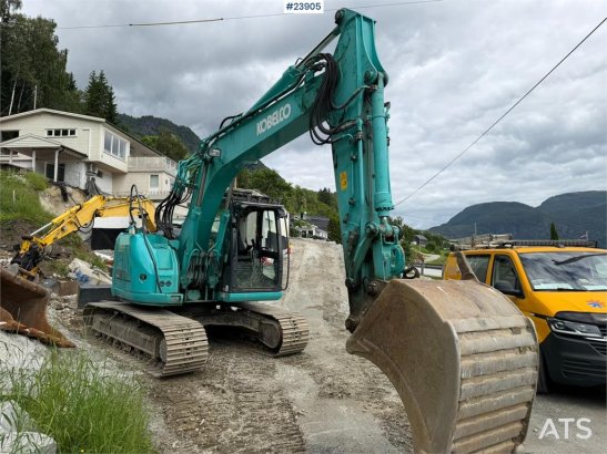 Kobelco Sk140SRLC-3 excavator equipped with a tooth bucket Sk140SRLC-3 excavator equipped with a tooth bucket 2015 2 Crawl...