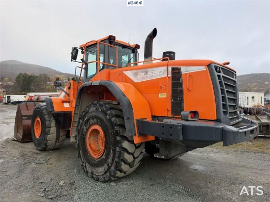 Doosan DL550-5 wheel loader with scale, bucket, and new t Doosan DL550-5 wheel loader with scale, bucket, and new t 2015 2...