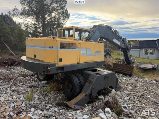Åkerman EW230 wheeled excavator with two buckets and tiltr EW230 wheeled excavator with two buckets and tiltr 1992 2 Wheel...