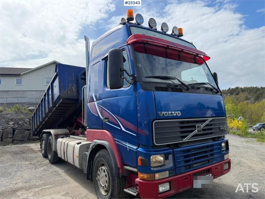 Volvo FH12 6x2 hook truck with a 20-ton hook and contain 590 2000 2 image 4