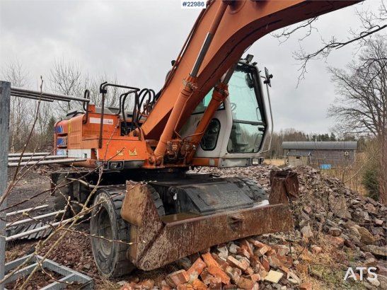 Fiat-Hitachi 150W.3 wheeled excavator with rototilt and grading Fiat-Hitachi 150W.3 wheeled excavator with rototilt and gr...