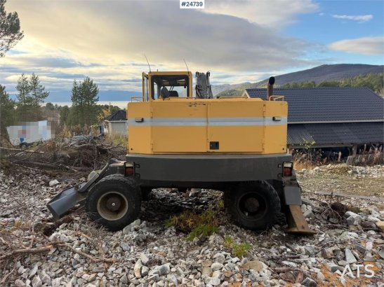 Åkerman EW230 wheeled excavator with two buckets and tiltr EW230 wheeled excavator with two buckets and tiltr 1992 2 Wheel...