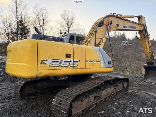 New Holland E265 Excavator with tooth bucket and defective rot E265 Excavator with tooth bucket and defective rot 2006 2 C...