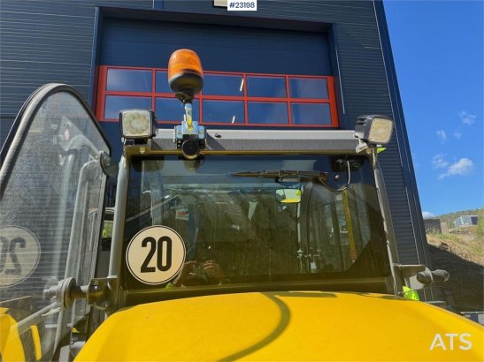 Kramer 5055E Wheel Loader with plow, pallet forks and 2 b Kramer 5055E Wheel Loader with plow, pallet forks and 2 b 2022 2...