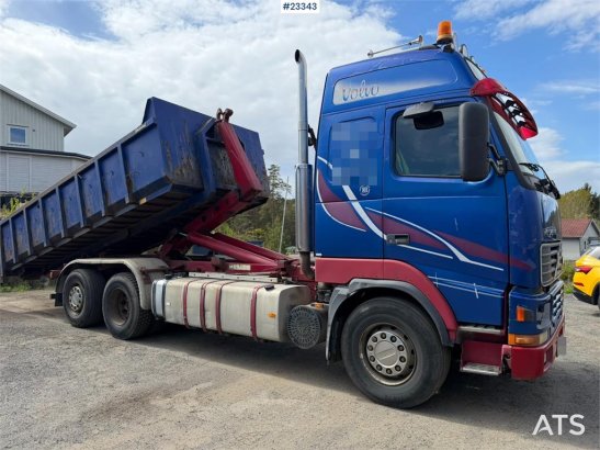Volvo FH12 6x2 hook truck with a 20-ton hook and contain 590 2000 2 image 5