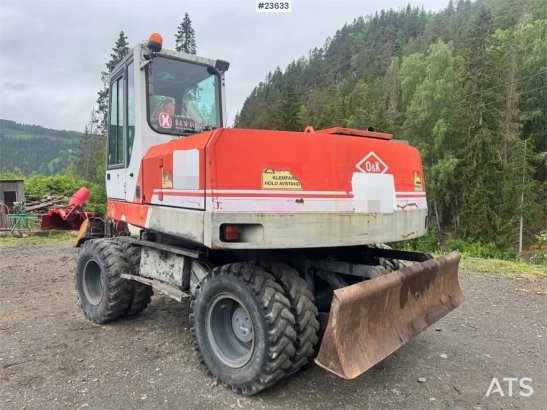 O&K MH4 Wheeled Excavator with Grading Bucket WATCH VI MH4 Wheeled Excavator with Grading Bucket WATCH VI 1998 2 Wheeled E...