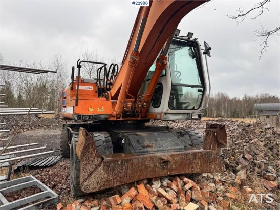 Fiat-Hitachi 150W.3 wheeled excavator with rototilt and grading Fiat-Hitachi 150W.3 wheeled excavator with rototilt and gr...
