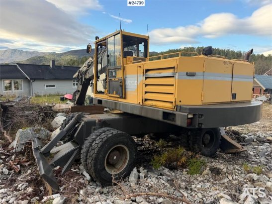 Åkerman EW230 wheeled excavator with two buckets and tiltr EW230 wheeled excavator with two buckets and tiltr 1992 2 Wheel...