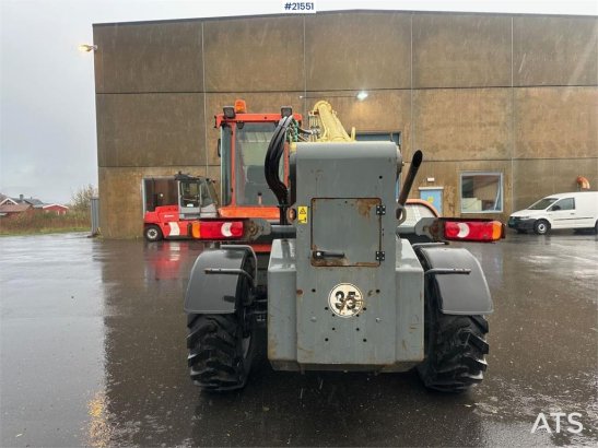 JLG 4017 telehandler w/ two pallet forks and bucket. C 4017 telehandler w/ two pallet forks and bucket. C 2007 2 Wheel Loa...