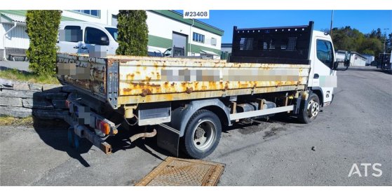 Mitsubishi Fuso Canter 4x2 flatbed truck for sale as a repair Fuso Canter 4x2 flatbed truck for sale as a repair 2019 2 im...