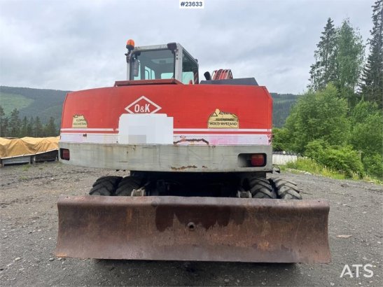 O&K MH4 Wheeled Excavator with Grading Bucket WATCH VI MH4 Wheeled Excavator with Grading Bucket WATCH VI 1998 2 Wheeled E...