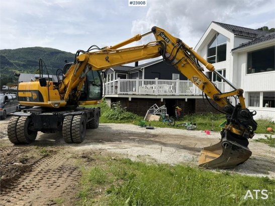 JCB JS145W wheeled machine with a cleaning bucket and JS145W wheeled machine with a cleaning bucket and 2008 2 Wheeled Exc...