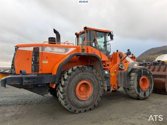 Doosan DL550-5 wheel loader with scale, bucket, and new t Doosan DL550-5 wheel loader with scale, bucket, and new t 2015 2...