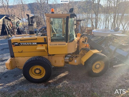 Volvo L50C wheel loader w/ 3 buckets, pallet forks, plow L50C wheel loader w/ 3 buckets, pallet forks, plow 1996 2 Wheel L...