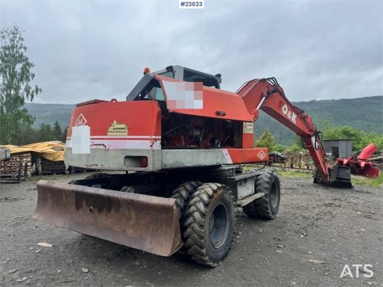 O&K MH4 Wheeled Excavator with Grading Bucket WATCH VI MH4 Wheeled Excavator with Grading Bucket WATCH VI 1998 2 Wheeled E...