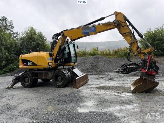 CAT M313 D wheeled excavator with Indexator tilt and S M313 D wheeled excavator with Indexator tilt and S 2013 2 Wheeled E...