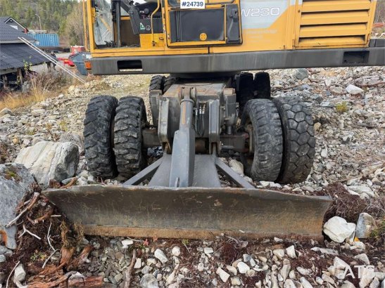 Åkerman EW230 wheeled excavator with two buckets and tiltr EW230 wheeled excavator with two buckets and tiltr 1992 2 Wheel...