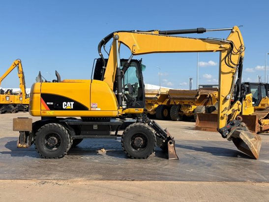Caterpillar M313D VA - Outriggers + Blade M313D VA - Outriggers + Blade 2012 2 Wheeled Excavators image 7